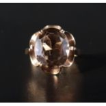 SMOKY QUARTZ SINGLE STONE RING the oval cut quartz measuring approximately 12mm x 9.6mm x 6.4mm,