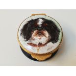 EXIMIOUS OF LONDON ENAMEL PILL BOX with a circular lift up lid decorated with a King Charles dog,