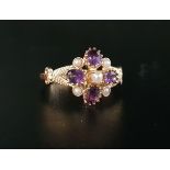 AMETHYST AND SEED PEARL CLUSTER RING the four oval cut amethysts interspersed with five seed pearls,