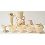 SELECTION OF BELLEEK POTTERY decorated in the Shamrock pattern, comprising a twin handled vase, 20cm