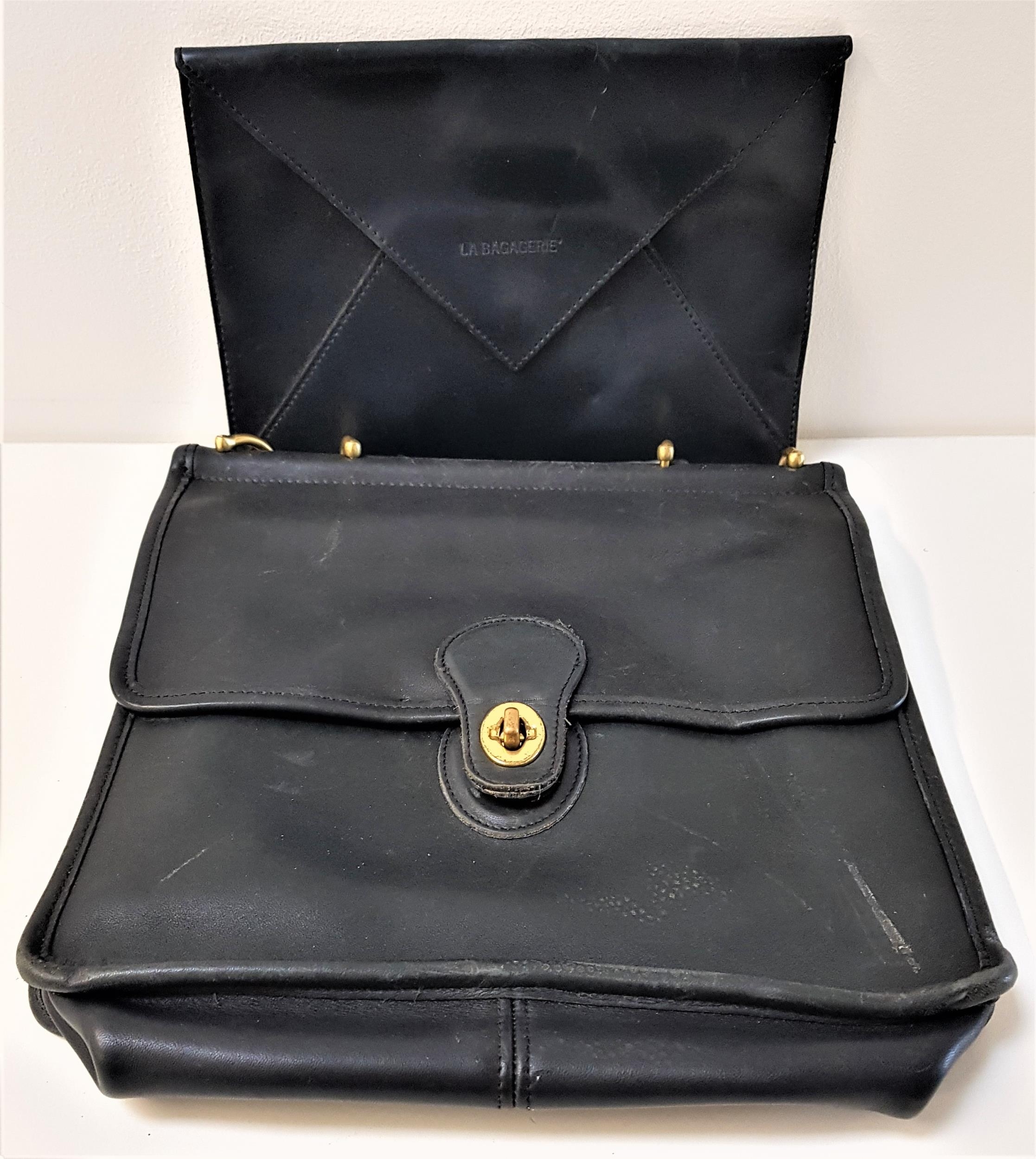 VINTAGE COACH WILLIS HANDBAG in black leather and numbered H6U-9927, together with a La Bagagerie