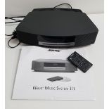 BOSE WAVE MUSIC SYSTEM with remote control and instructions
