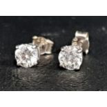 PAIR OF DIAMOND STUD EARRINGS the round brilliant cut diamonds approximately 0.2cts each (total