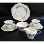 ROYAL PARAGON TEA SERVICE decorated with flowers and comprising cups and saucers, tea bowl, milk
