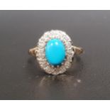 TURQUOISE AND DIAMOND CLUSTER RING the central oval cabochon turquoise in sixteen diamond
