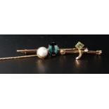 TWO GEM SET GOLD BROOCHES AND A STICK PIN one brooch set with peridot and seed pearl in nine carat
