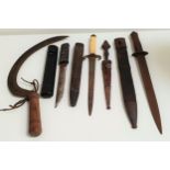 AFRICAN TRIBAL KNIFE with a stiletto 18cm blade and leather covered handle and sheath, Japanese
