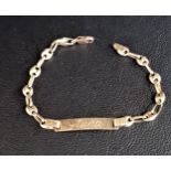 CHILD'S FOURTEEN CARAT GOLD IDENTITY BRACELET the central panel engraved 'Anna', 15cm long and