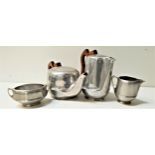 PICQUOT WARE TEA SERVICE comprising a tea pot, hot water jug, milk jug and sugar bowl (4)