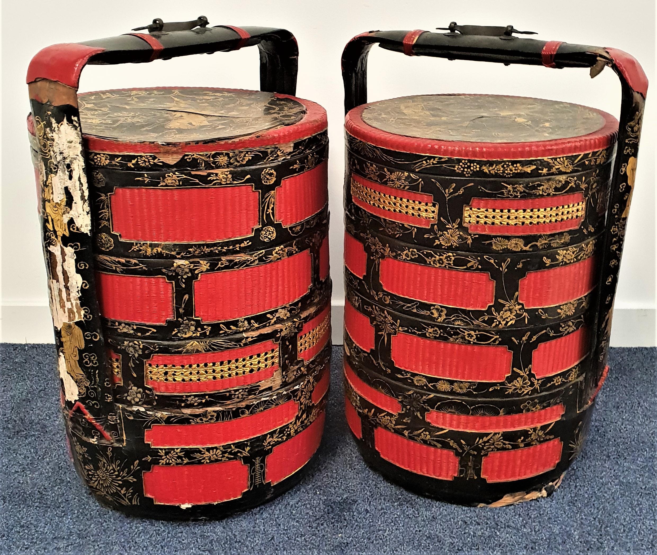 PAIR OF LARGE CHINESE WEDDING BASKETS each with four lidded compartments decorated with red and
