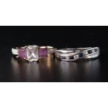 TWO GEM SET RINGS comprising an amethyst and CZ three stone ring in nine carat gold, and a channel