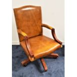 MAHOGANY FRAME LEATHER ARMCHAIR in mustard yellow with a padded back, arms and seat with