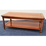 GRANGE CHERRY OCCASIONAL TABLE with a rectangular top standing on turned supports united by an