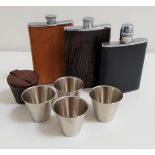 THREE HIP FLASKS two 8oz and one 6oz capacity and four stainless steel nip cups