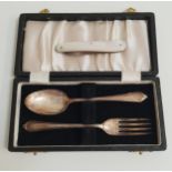 ELIZABETH II SILVER CHRISTENING SET comprising a fork and spoon, the terminals engraved S.M.C.,
