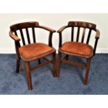 PAIR OF ELM ELBOW CHAIRS with hoop slat backs above stuffover seats with decorative stud detail,
