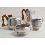 PICQUOT WARE TEA SERVICE comprising a tea pot, hot water jug, sugar bowl and milk jug (4)