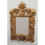 COMBINATION WALL/DRESSING TABLE MIRROR with a plain rectangular plate and a carved and pierced