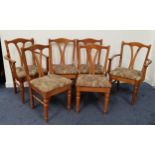 SET OF DUCAL OAK DINING CHAIRS comprising four single and two carvers with shaped top rails above