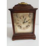 WINTERHALDER & HOFMEIER MANTLE CLOCK in a mahogany case with four bevelled glass panels, the