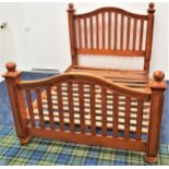 VIETNAMESE TEAK KING SIZE BED with an arched slatted head and footboard, plank sides and a slatted