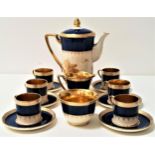 CROWN DEVON FIELDINGS COFFEE SET decorated in blue and gilt, the cups, milk jug and sugar bowl