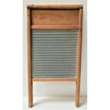 SWEDISH WASHBOARD in a pine frame with a serrated metal board, 60cm long