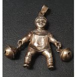 GEORGE V SILVER RATTLE in the form of a child holding a bell in each hand, Birmingham hallmarks
