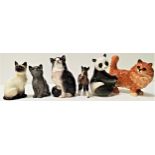 THREE BESWICK CATS comprising a ginger tom, 13cm high, seated Siamese, 10.5cm high and a seated