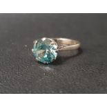 BLUE TOPAZ SINGLE STONE RING the topaz approximately 2.5cts, on eighteen carat white gold shank,