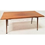 1960s TEAK OCCASIONAL TABLE with a rectangular moulded top, standing on four screw in supports, 92cm