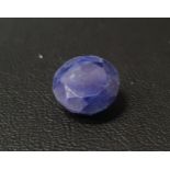 CERTIFIED LOOSE NATURAL BLUE SAPPHIRE the round mixed cut blue sapphire weighing 16.4cts, with GLI