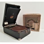 HMV GRAMOPHONE in a hard shell case, together with twenty seven records