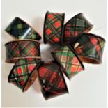 EIGHT TARTANWARE NAPKIN RINGS marked Prince Charlie, Caledonia, MacLean, McBeth and Gordon (8)