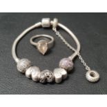 PANDORA MOMENTS SILVER CHARM BRACELET with sparkling pave clasp and, three heart shaped charms,