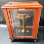 SET OF GERTLING SCIENTIFC SCALES in a mahogany and glass case, with adjustable feet, model 48GC,
