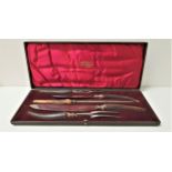 VICTORIAN SILVER MOUNTED DOUBLE CARVING SET comprising two knives and forks and a steel, all with
