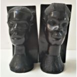 PAIR OF CARVED AFRICAN EBONY BOOKENDS depicting elegant African ladies heads, 22cm high (2)