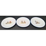 THREE LIMOGES PORCELAIN PLATES decorated with a blue rim and scenes of children playing tennis,