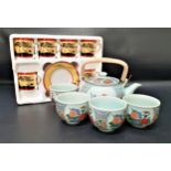 CHINESE EXPORT WARE TEA SET comprising four tea bowls and a tea pot, decorated in a pale green
