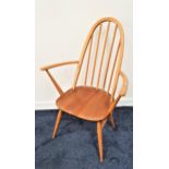 ERCOL QUAKER CARVER CHAIR with an arched beech stick back above an elm seat, standing on turned