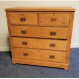 EDWARDIAN PINE WAXED CHEST with a moulded top above two short and three long drawers, standing on