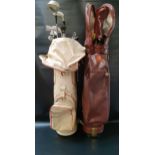 TWO PART SETS OF GOLF CLUBS contained in a brown Slazenger snake skin effect bag with a Northwestern