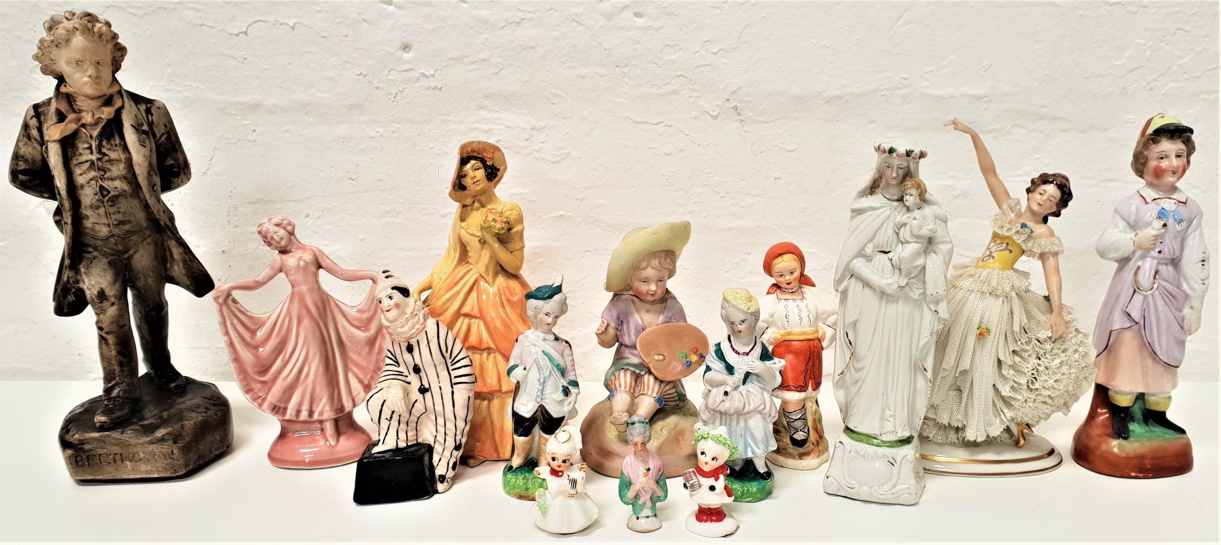 SELECTION OF FIGURINES including a Dresden female dancer, bisque porcelain child painter, Romanian