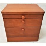 TEAK SMALL BEDSIDE CHEST with a pull out shelf above two drawers, standing on a plinth base, 55cm