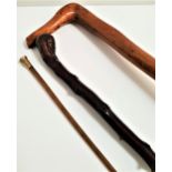 VINTAGE RIDING CROP with a gold plated finial and fibreglass shaft, 64cm long, and two gnarled