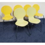 SET OF SIX ARNE JACOBSEN STYLE DINING CHAIRS of one piece wood construction and standing on chrome