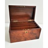 VICTORIAN WALNUT STATIONARY BOX the sloping lift up lid inset with a brass plaque, the interior with