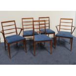 SET OF FIVE TEAK DINING CHAIRS comprising two carvers and three singles, with ladder backs above