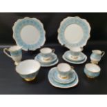 ROYAL STAFFORD TEA AND COFFEE SET decorated with a pale blue border with gilt highlights, comprising